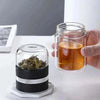 Black SipEase tea infuser separated from the 200ml glass bottle