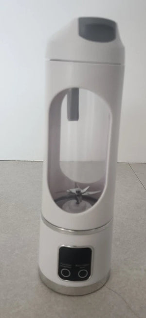 White electric pepper grinder on a light gray surface with a white background