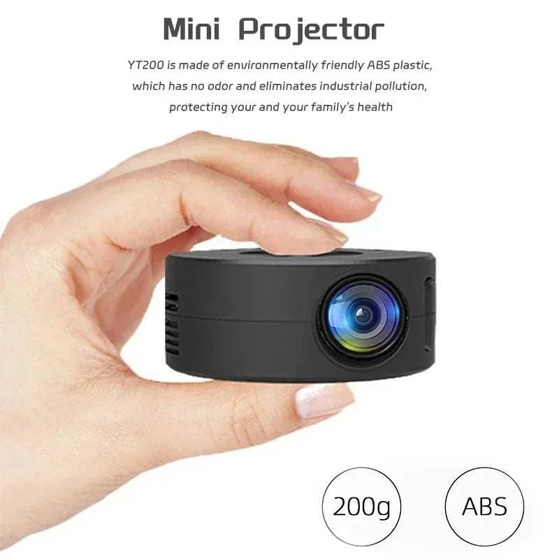 Hand holding a mini projector with text about its material and weight.