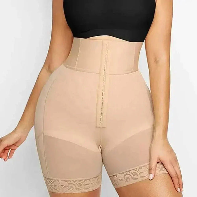 Black high-rise sculpting shorts with seamless fit on model – gym activewear