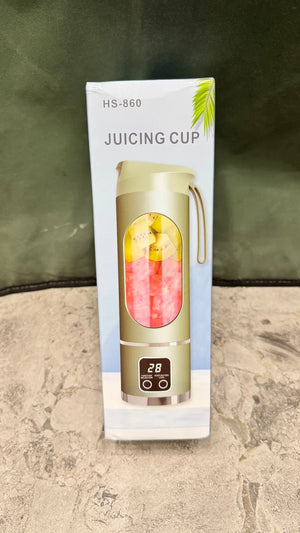 Juicing cup with digital display on a stone surface